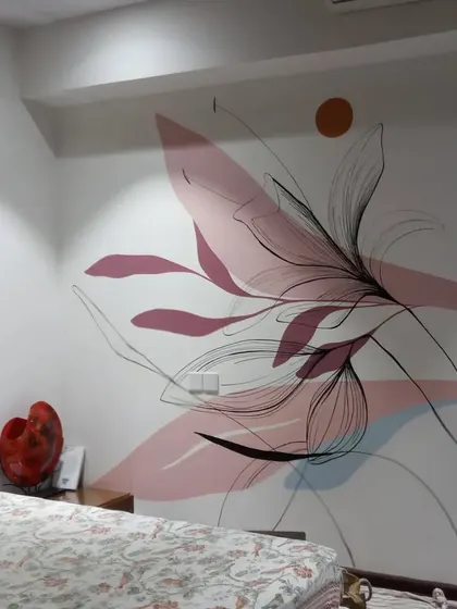 A closer look at the boho mural, showing how the abstract pink shapes and delicate black line art interact. It's a balance of boldness and subtlety.