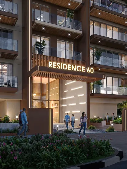 A close-up evening shot of the entrance to "Residence 60." The warm lighting from the lobby and signage creates an inviting and secure feeling for the residential building.