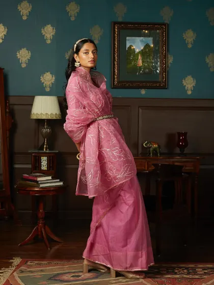 A dynamic pose from the same shoot, showcasing the beautiful drape and flow of the organza sari. My art direction focuses on capturing the movement and life of the fabric.