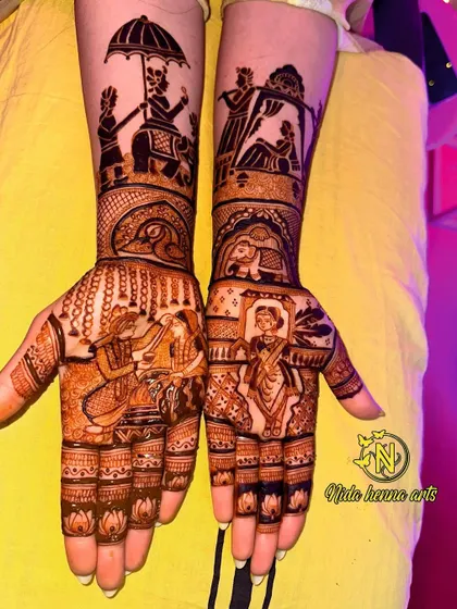 Another angle of the same intricate bridal mehandi, showing the different story elements on each hand.