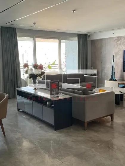 A spacious living and dining area from the DLF Belaire project, showing a modern, open-plan layout perfect for family life and entertaining.