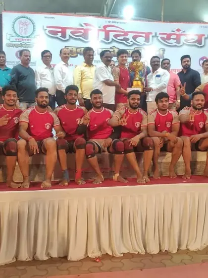 Posing with the runners-up trophy, our players show pride in their performance.