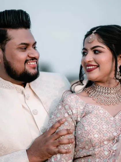 A happy, candid moment between the newly engaged couple. We love capturing these unposed interactions that show the real love and connection.