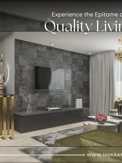 Experience the epitome of quality living with this dramatic living room design. A textured, dark stone wall serves as a powerful backdrop for the TV, complemented by a sleek console and luxurious gold accents for a truly glamorous feel.