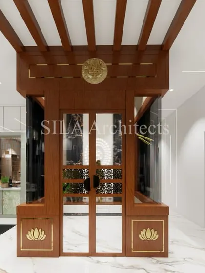 A beautifully rendered traditional pooja unit with intricate wooden details, integrated into a modern living space. This shows our skill in blending different design styles.