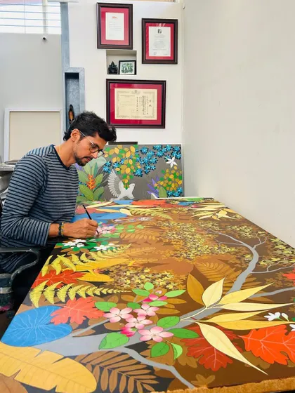 A behind-the-scenes look at artist Ganapati Hegde in his studio. His surrealistic compositions, which dance with nature and mythology, were featured in our 'On The Go' showcase.
