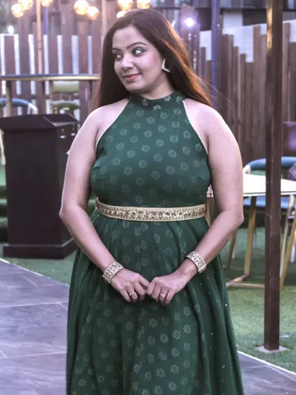 A portrait in a green fusion dress, which I wore to host an event for a global beauty and wellness brand. The outfit was a perfect blend of Indian elegance and Western comfort, ideal for an event with international delegates.