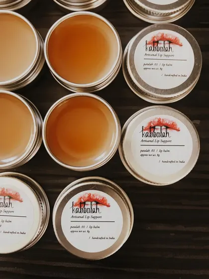 My 'Patalah' lip balm, handcrafted in India. The label is simple and clean, reflecting the pure ingredients inside.