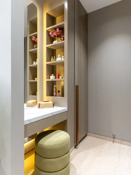 This bespoke vanity nook is all about refined routines and quiet luxury. From the sleek marble countertop to the soft glow of recessed lighting, every detail is designed to celebrate self-care in style.
