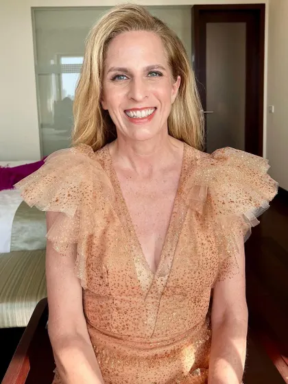 The final look for the NMACC event. I used warm, peachy tones and a touch of shimmer to create a radiant, sun-kissed glow on her mature skin.