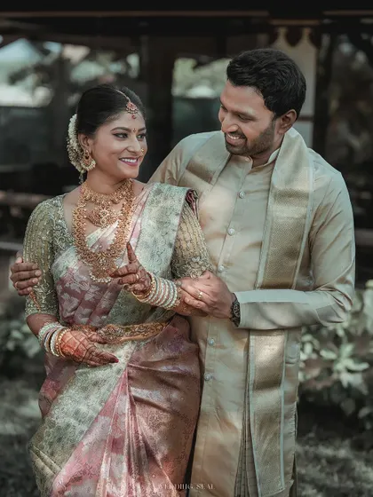 A portrait of pure happiness. The bride's joyful expression as she holds onto her groom is a perfect example of the candid, love-filled moments I aim to capture.