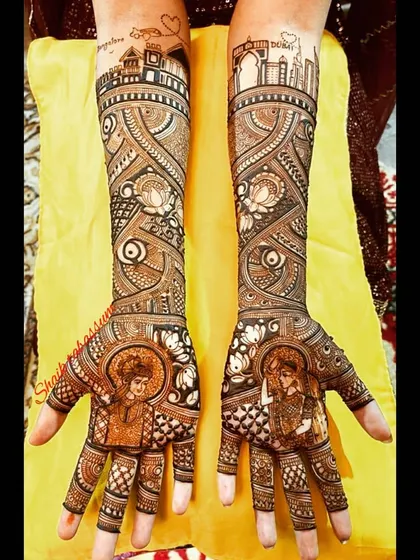 Your mehendi can tell the story of your journey. This unique design features the skylines of Bangalore and Dubai, representing special places in the couple's relationship. I am happy to travel for destination weddings.