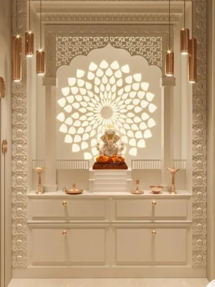 An exquisite home mandir crafted from white material, featuring a backlit Ganesha against a lotus-petal-inspired backdrop. This design showcases our ability to blend spiritual motifs with contemporary aesthetics, creating a serene and luxurious sacred space.