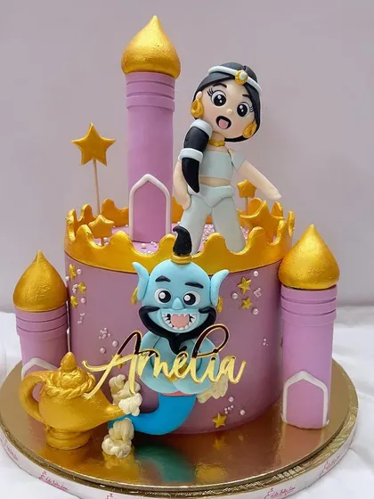 A princess Jasmine castle cake. This design focuses on Jasmine in her purple palace, with the Genie and his magic lamp adding a touch of whimsy.