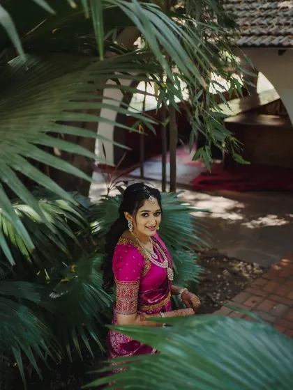 The bride posing in a beautiful outdoor setting.