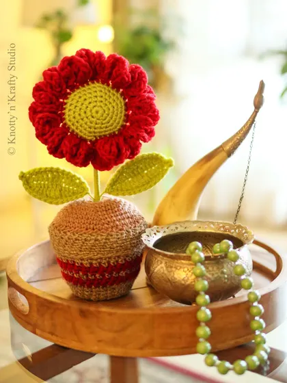 Another beautiful shot of the red flower vignette, capturing the soft sunlight and peaceful mood.