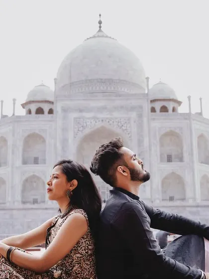 A modern pose against a timeless backdrop. This shot at the Taj Mahal captures a stylish and confident portrait, showing how you can blend contemporary style with a classic location.