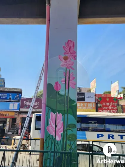 A beautiful painting of lotus flowers on a flyover pillar in Chandigarh. We believe in turning mundane infrastructure into public art that everyone can enjoy.