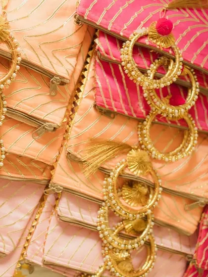 For this Haldi ceremony, I arranged these beautiful party favors, featuring traditional gota patti pouches and bangles, as part of the decor and guest experience.