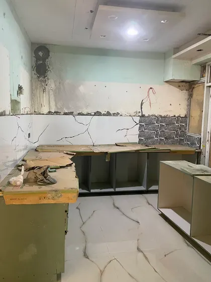 The site after demolition and before the new kitchen installation begins. A blank canvas for a beautiful new design.