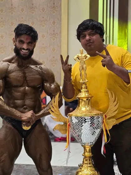 Another shot with the title trophy. The smile of a winner who has given his all. I am incredibly proud of his achievement.