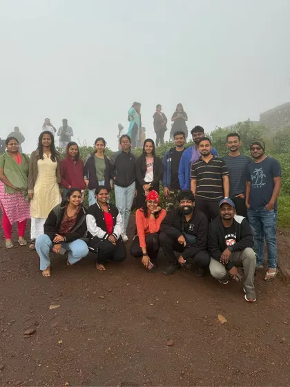 A group photo on a foggy day on the trails.