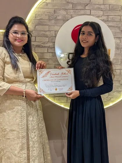 Celebrating another student's successful completion of the intensive mehndi course.