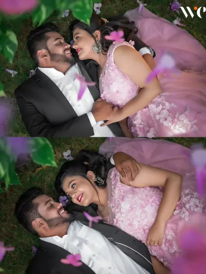 A romantic overhead shot of a couple lying in the grass, framed by flowers. This creative angle provides a unique and intimate perspective for their pre-wedding photos.