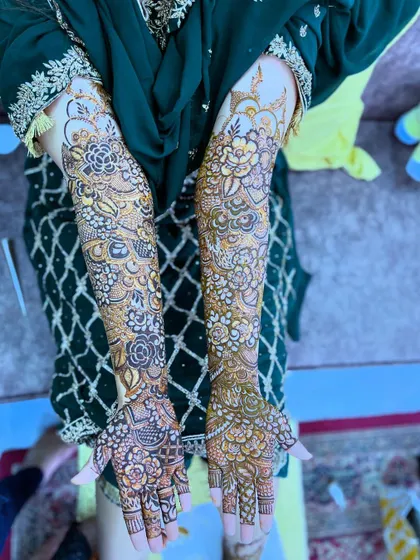 A different angle of Saima's bridal henna, highlighting the beautiful details and full coverage.