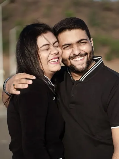 A portrait of pure happiness. Their big, genuine smiles and warm embrace say everything about their love story. This is the kind of joyful, candid moment I love to capture.