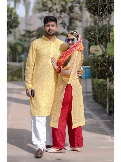 A classic couple portrait from a Haldi ceremony. We guide our couples into poses that feel natural and look beautiful.