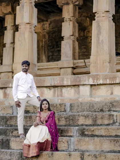 A powerful and elegant pose on the steps of an ancient temple. This pre-wedding shoot captures a sense of timeless love.
