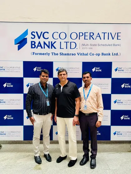 Prakash Padukone with representatives from SVC Co-operative Bank, a key sponsor. We work closely with our partners to ensure prominent branding and successful collaborations.