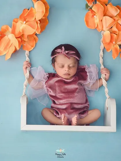 Our hanging swing prop is a client favorite. It creates a beautiful, whimsical image while keeping the baby safe and secure.