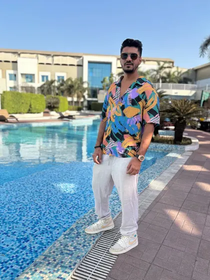 Arriving in style for a pool party gig. The DJ life means being ready to perform in any setting, from a dark club to a sunny poolside.