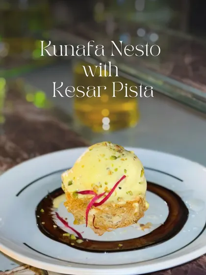 A fusion of Middle Eastern and Indian flavors, my Kunafa Nesto with Kesar Pista features a crispy shredded pastry base topped with a scoop of rich saffron and pistachio ice cream.