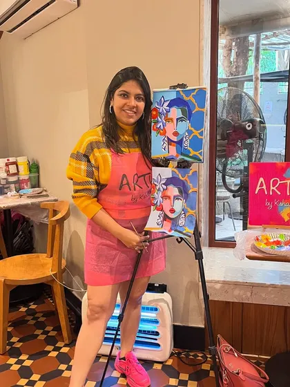 Me at one of my cafe workshops, in my element. I love setting up these creative escapes and guiding people through the artistic process.