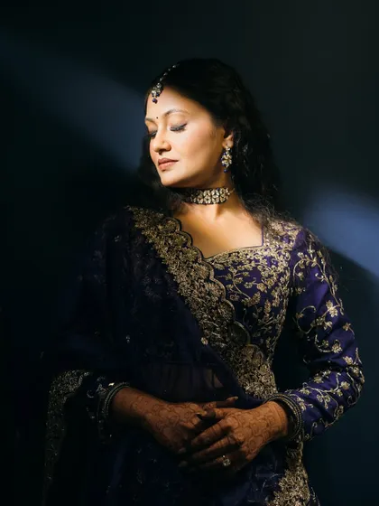 A close-up of the glam sangeet makeup, featuring soft smokey eyes and a flawless base.