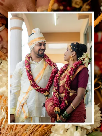 A classic portrait of the couple during their garland exchange ceremony.
