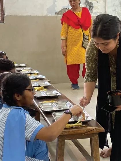 This is our partnership in action. The Khaana Chahiye Foundation serves meals to those in need, including these students. We are proud that every book purchased helps support their community kitchens run by transgender collectives and women's self-help groups.