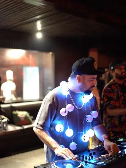 Even the DJ gets in on the costume fun. Rocking some festive lights while spinning spooky tracks.