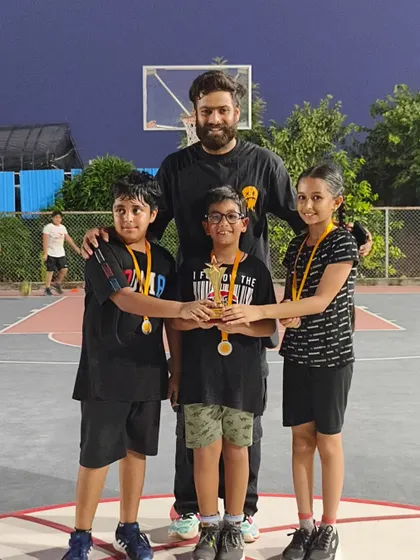 The U-10 runners-up team posing with their trophy. Every tournament is a learning experience.