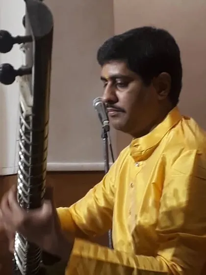 A profile shot capturing the mood of the morning raga performance.