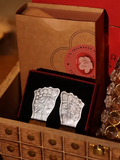 A detailed shot of the auspicious silver-plated Lakshmi feet included in one of my special Diwali hampers.