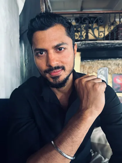 A simple, classic portrait in a black shirt. Sometimes the most powerful shots are the most simple.