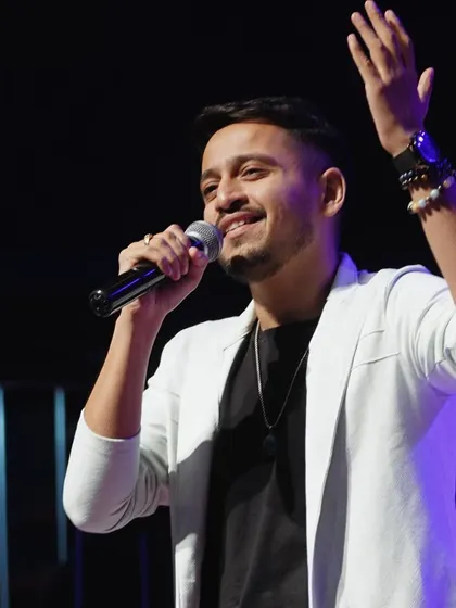 A happy moment on stage, connecting with the audience. The energy from the crowd is what fuels my performance.