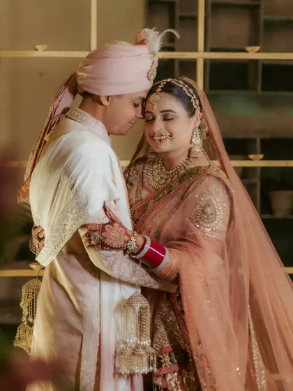 A tender moment between the newlyweds. This portrait of Shivam and Raghavi captures the quiet intimacy and deep connection they share right after their wedding ceremony.