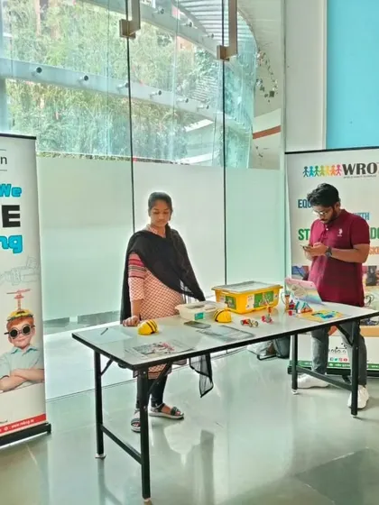 Our setup at the Total Environment, Whitefield promotional event, ready to welcome families and introduce them to the world of LEGO robotics.