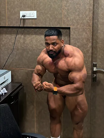 A most muscular pose, again showing the cupping marks. Recovery is part of the process.