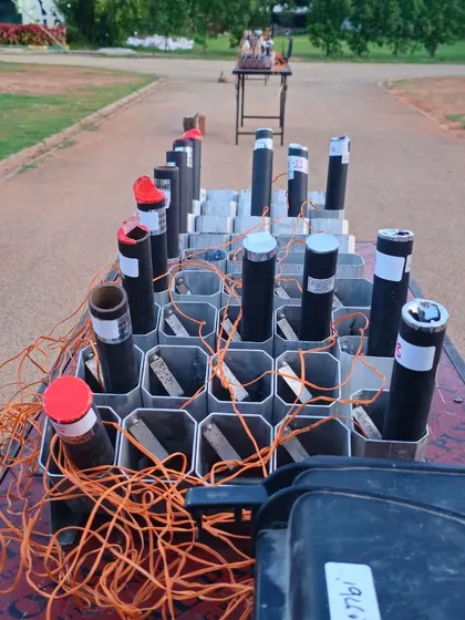 The organized chaos behind a professional pyrotechnic display. Every tube is carefully placed and wired to ensure a flawless and magical sky show.